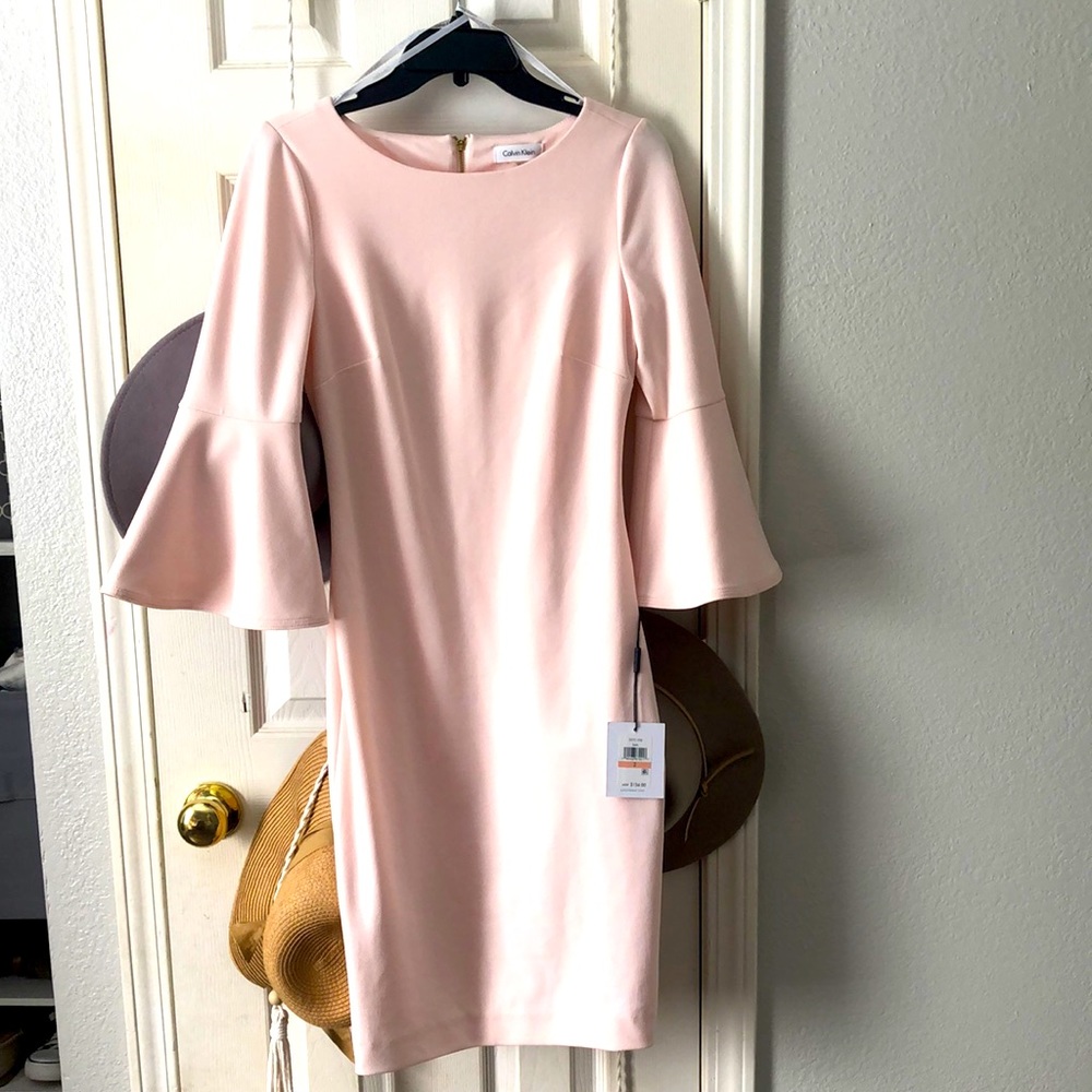 Calvin Klein pink business attire dress.